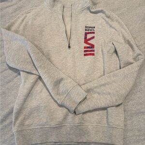 Women’s Super Bowl sweater size small